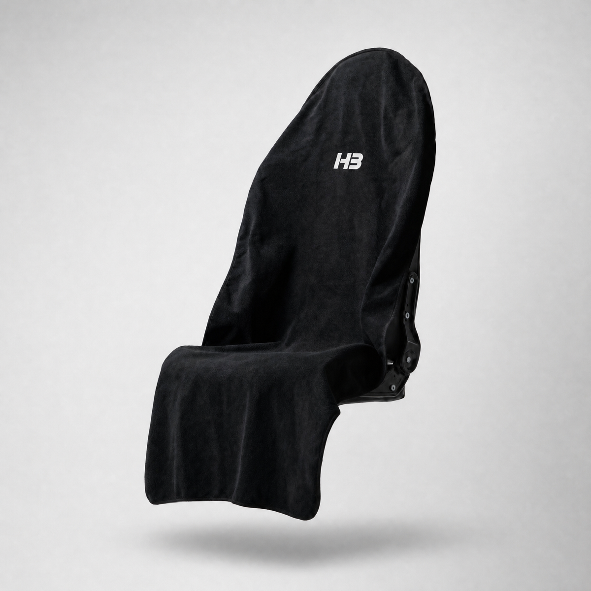 HydroBarrier waterproof seat cover in Black, draped over a car seat